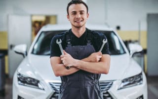 Handsome auto service mechanic