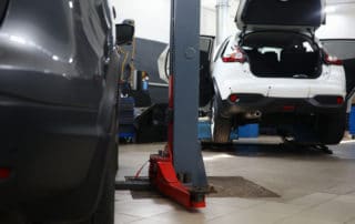 White vehicle with trunk open