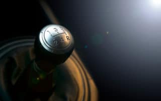 Close up view of a gear lever shift. Manual gearbox