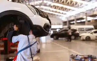 Expert technician servicing a luxury European vehicle in a West Palm Beach auto shop, ensuring top performance and reliability.