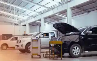 BMW and Audi in European repair shop
