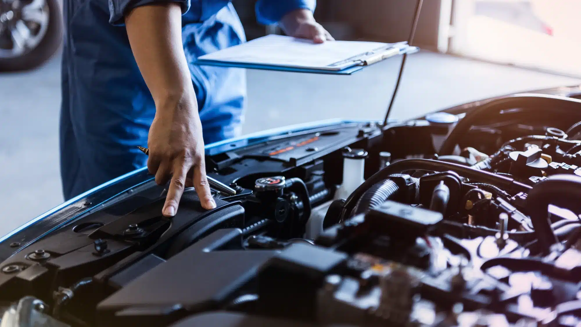foreign car mechanic performing maintenance to improve vehicle performance